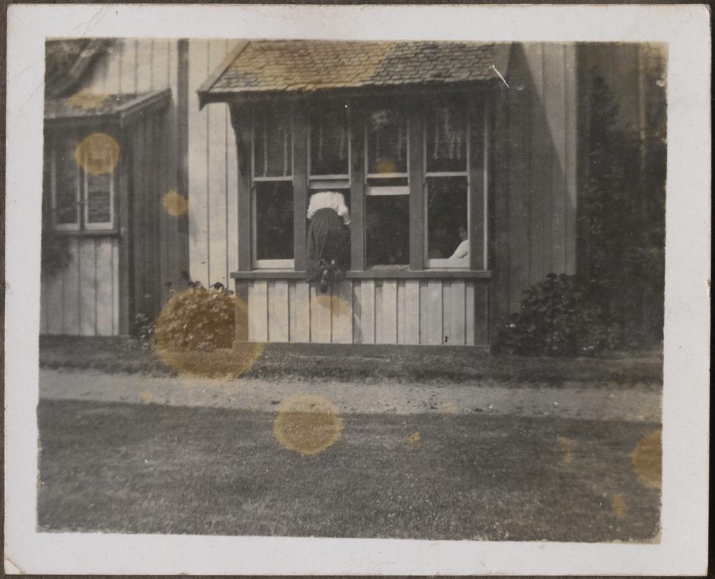 'The Head Pre...', showing girl climbing in window at Te Wai Pounamu College
