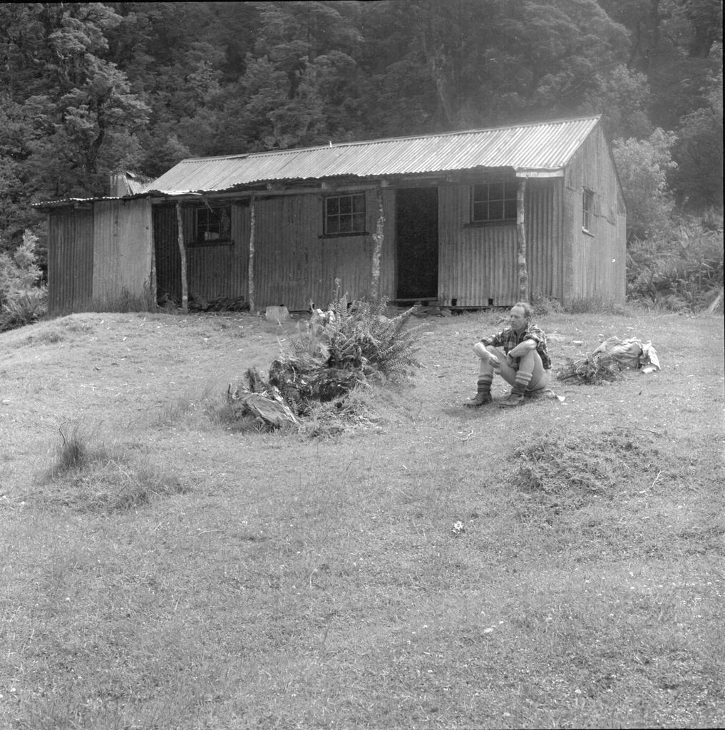 Man outside hut, Routeburn Track