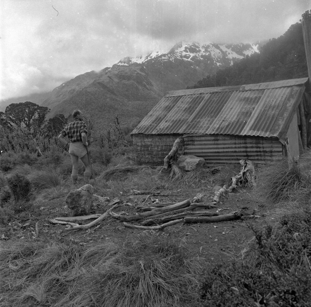 Man outside hut, Routeburn Track