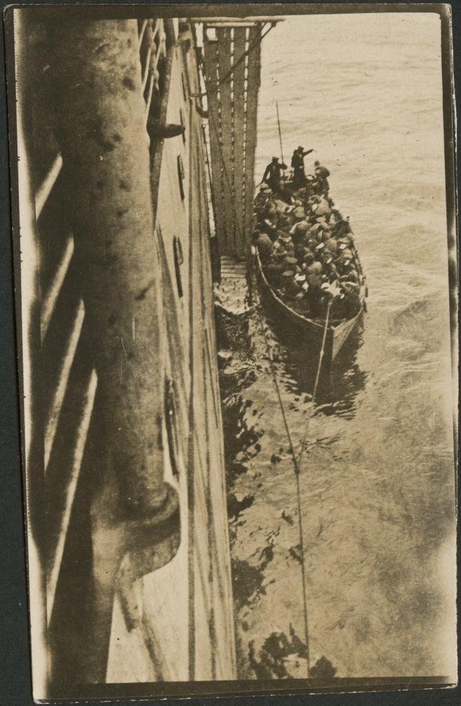 'Sick and wounded from ANZAC being brought aboard "Ivernia"'