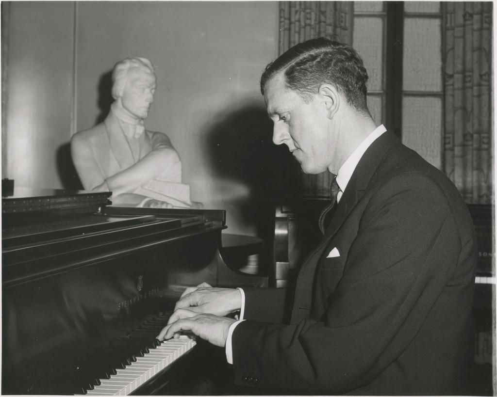 Maurice Till playing piano