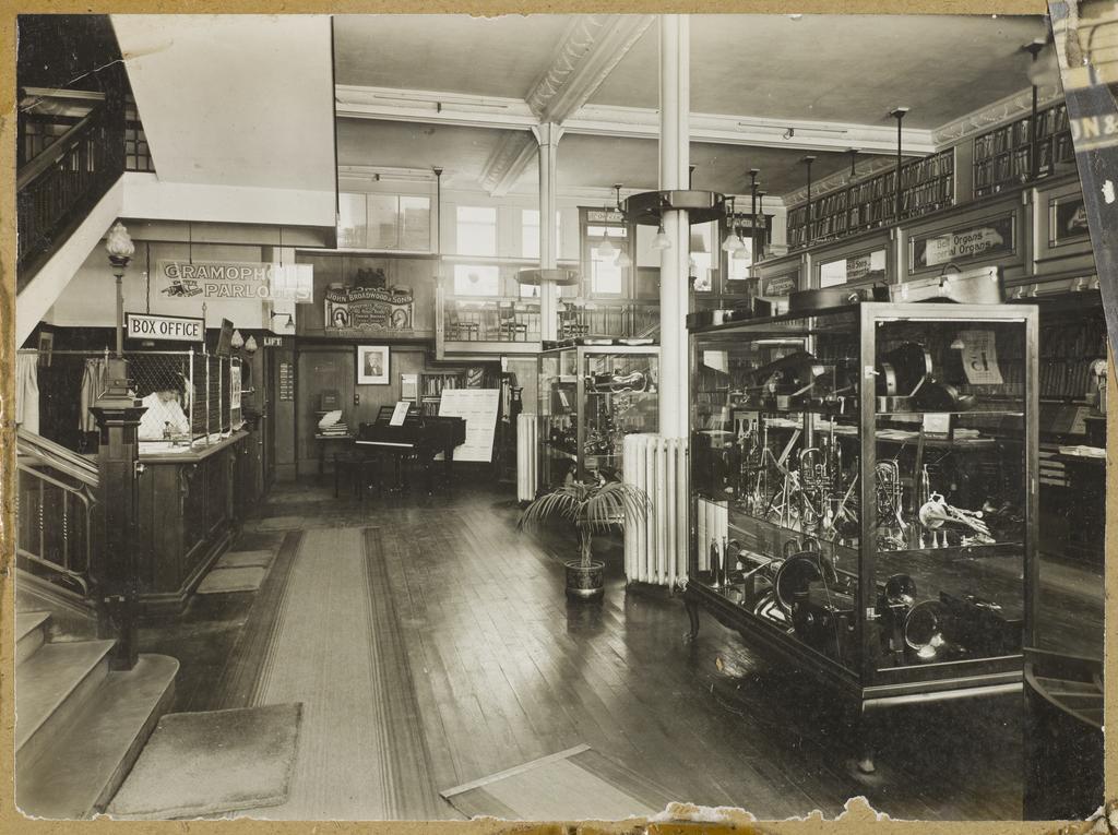 Brass instrument section and theatre box office, Bristol Piano Company, Princes Street, Dunedin