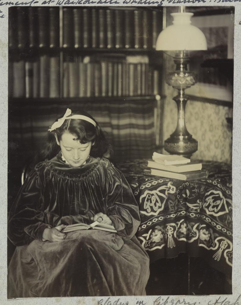 Gladys in library, Atahapara