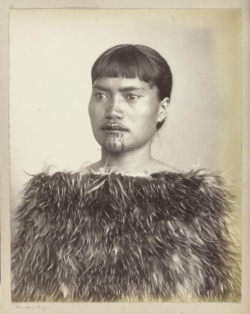 Unidentified young woman in a kahu kiwi, Hawke's Bay