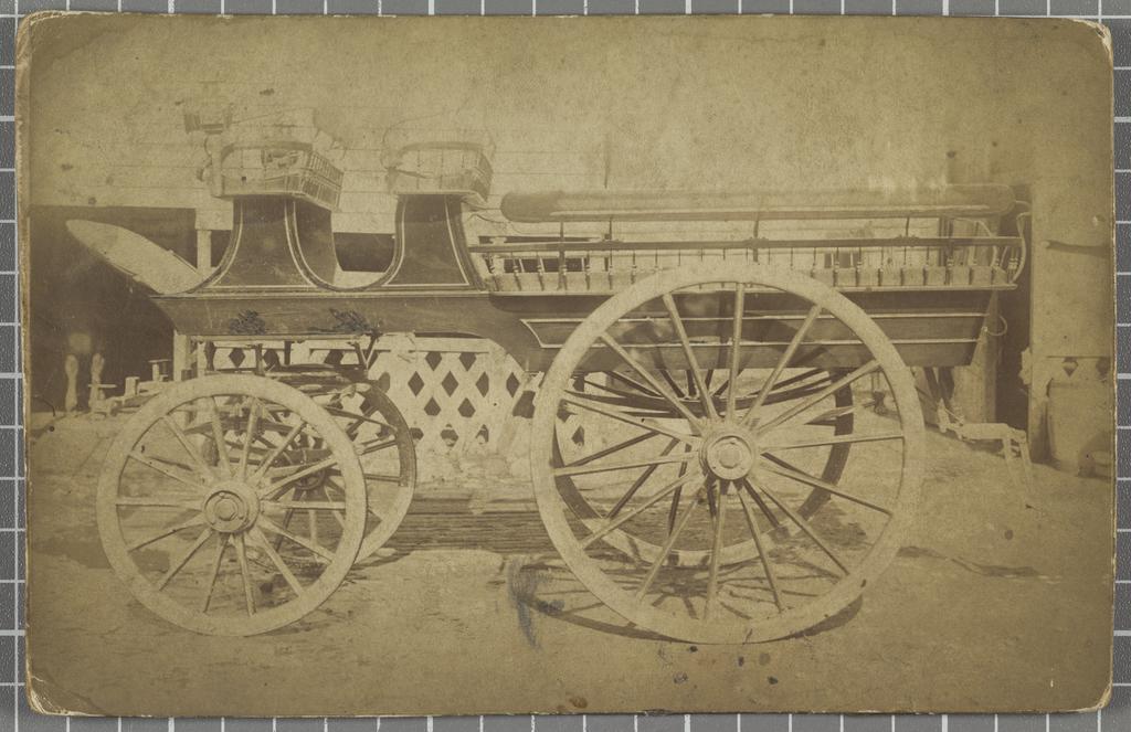 Four-wheeled horse-drawn open carriage with two front seats and side benches