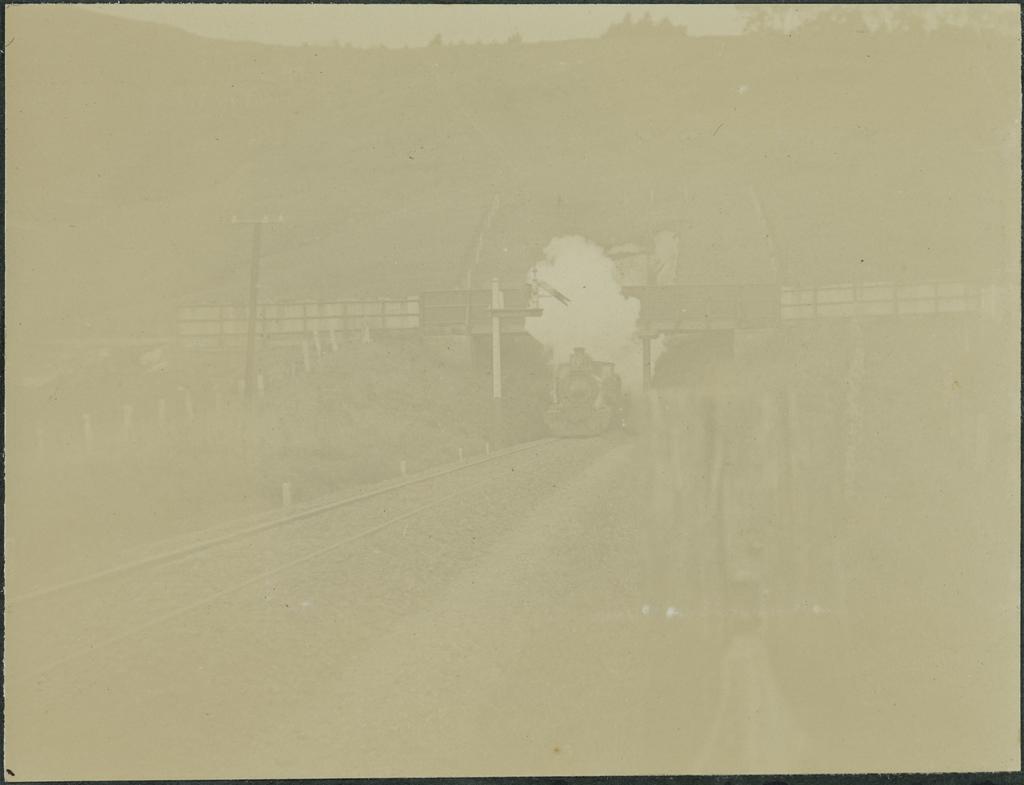 Train emerging from old tunnel, Burnside
