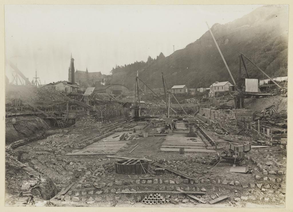 Elevated site view showing work of laying concrete bed