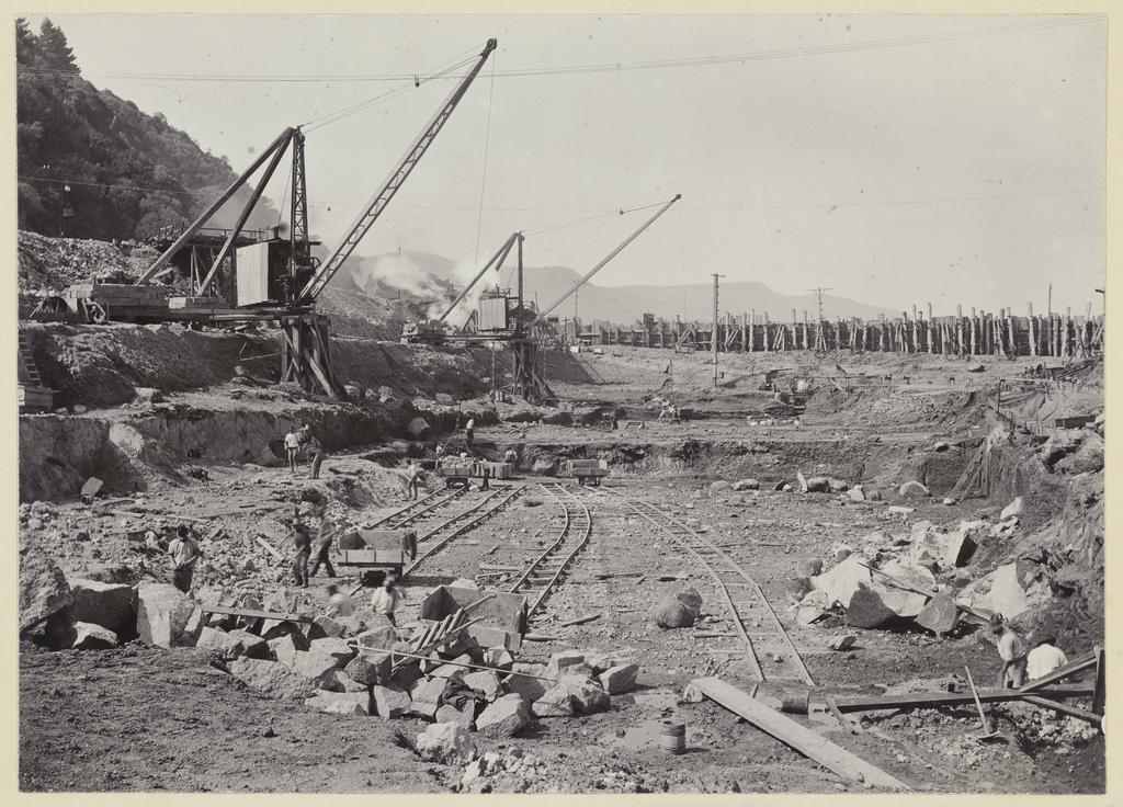 View of rail wagons, cranes and excavations
