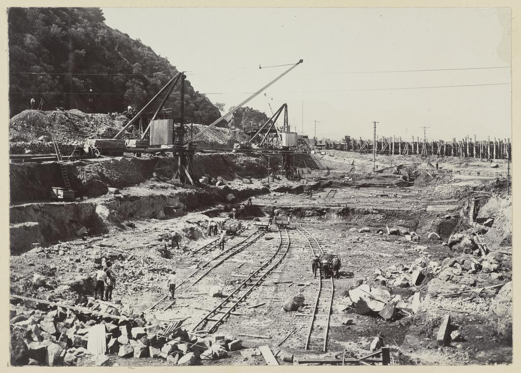 Rail wagons, cranes and excavations