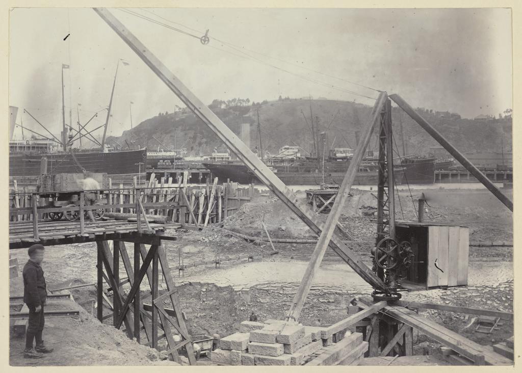 Boy at dock construction site