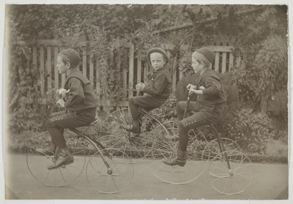 Jack Scott, George Chapman and Bob Scott on tricycles