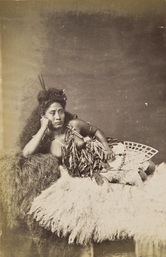 Unidentified young woman reclining