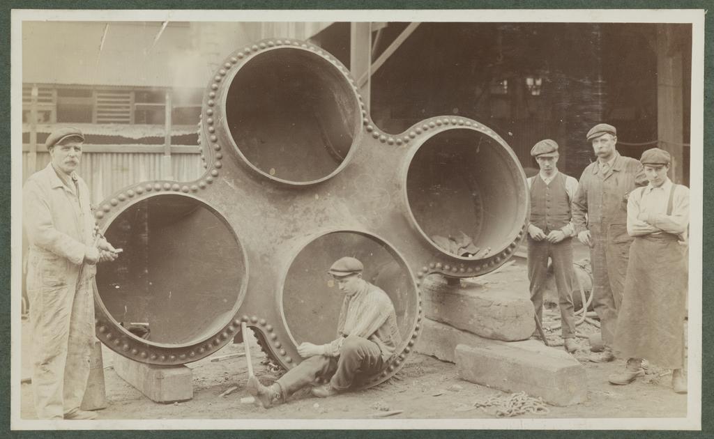 Five men with ship part