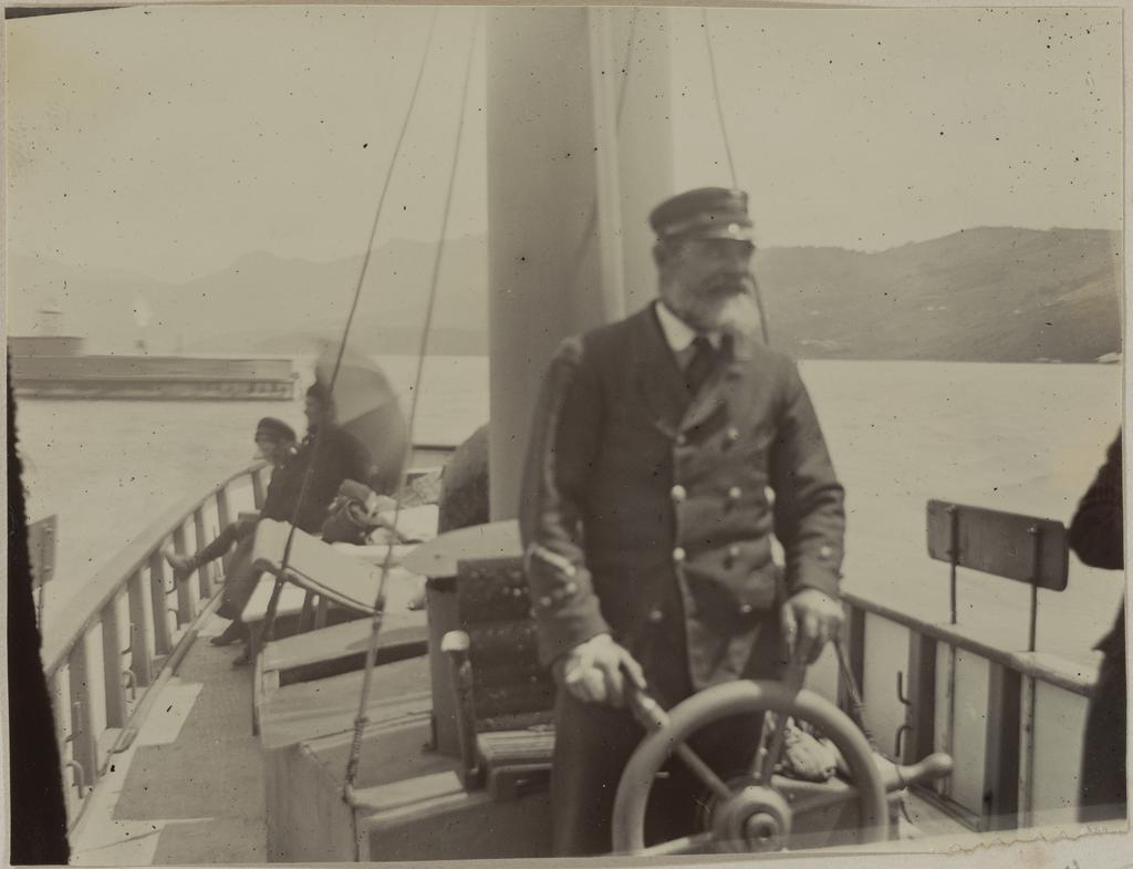 Captain Densen at the Helm