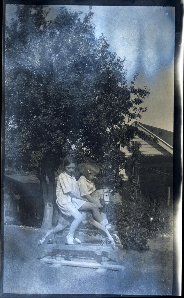 Girls on a rocking horse