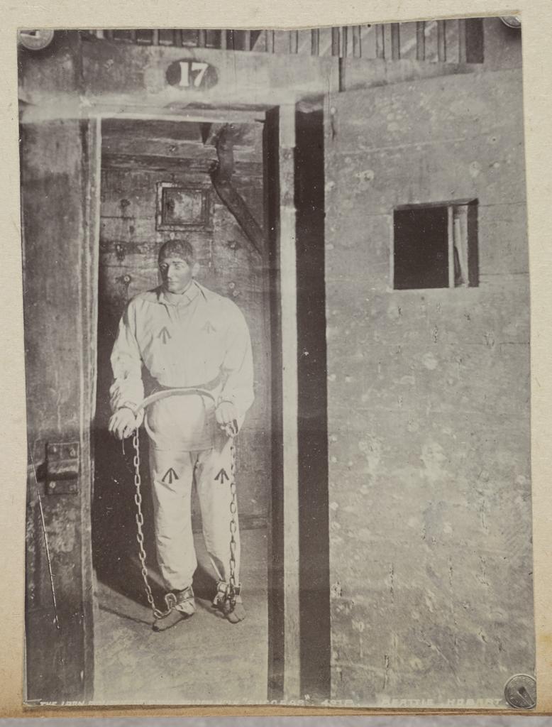 Model of prisoner in shackles