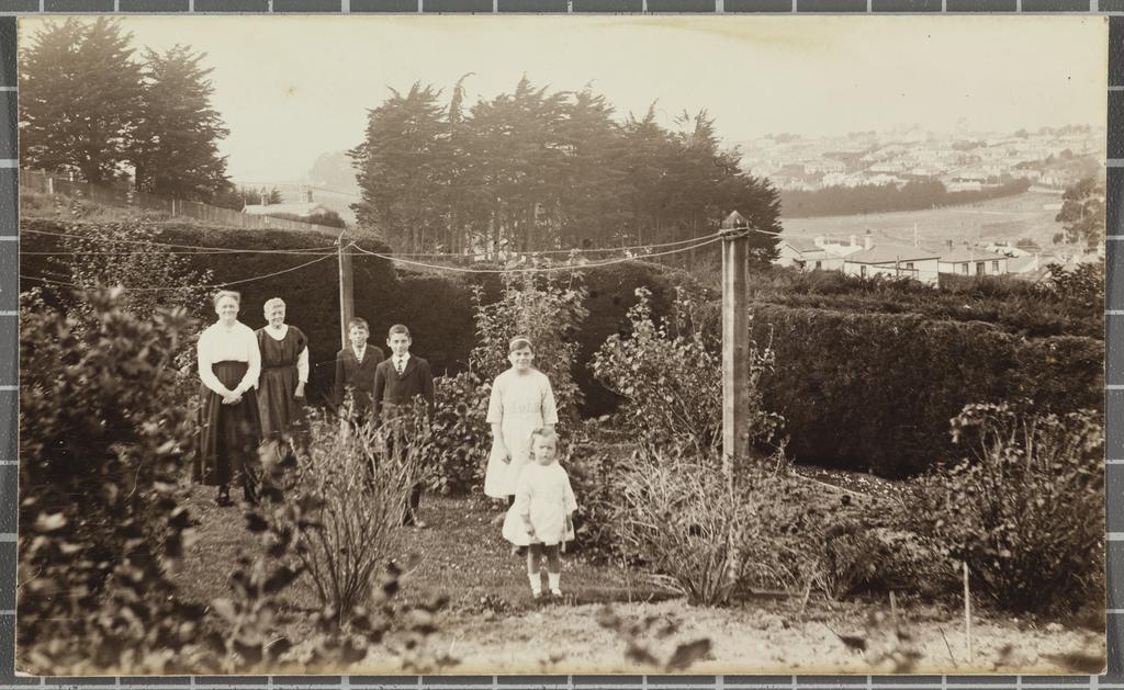 Unidentified family in garden
