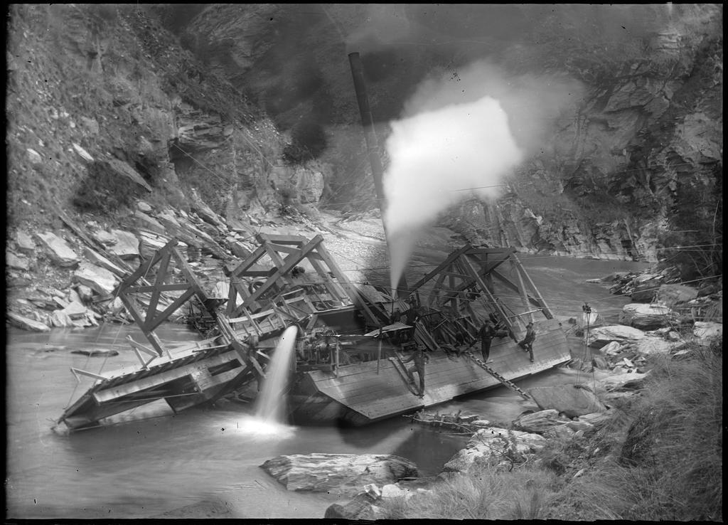 Sunken dredge being refloated