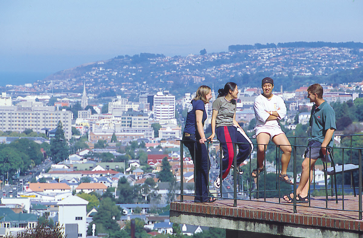 Students on rooftop with city view, Aquinas College