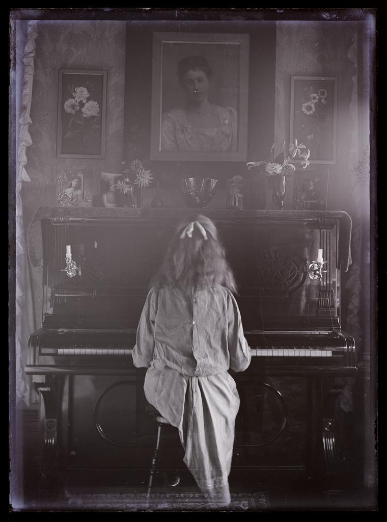 Marion Scott playing the piano
