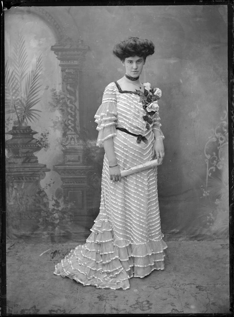Young woman holding a scroll