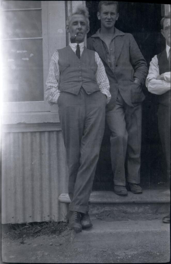 Pipe-smoking man in tie