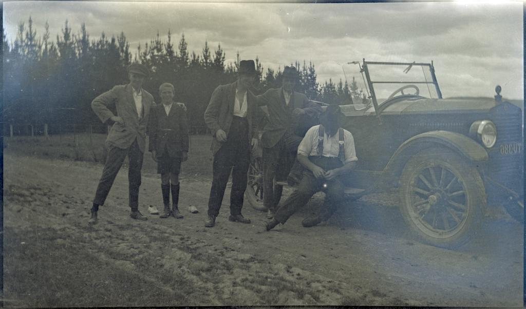 Five men beside a car, Beaumont
