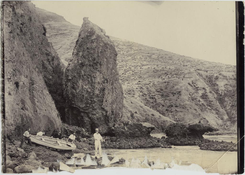 Five men with a dinghy