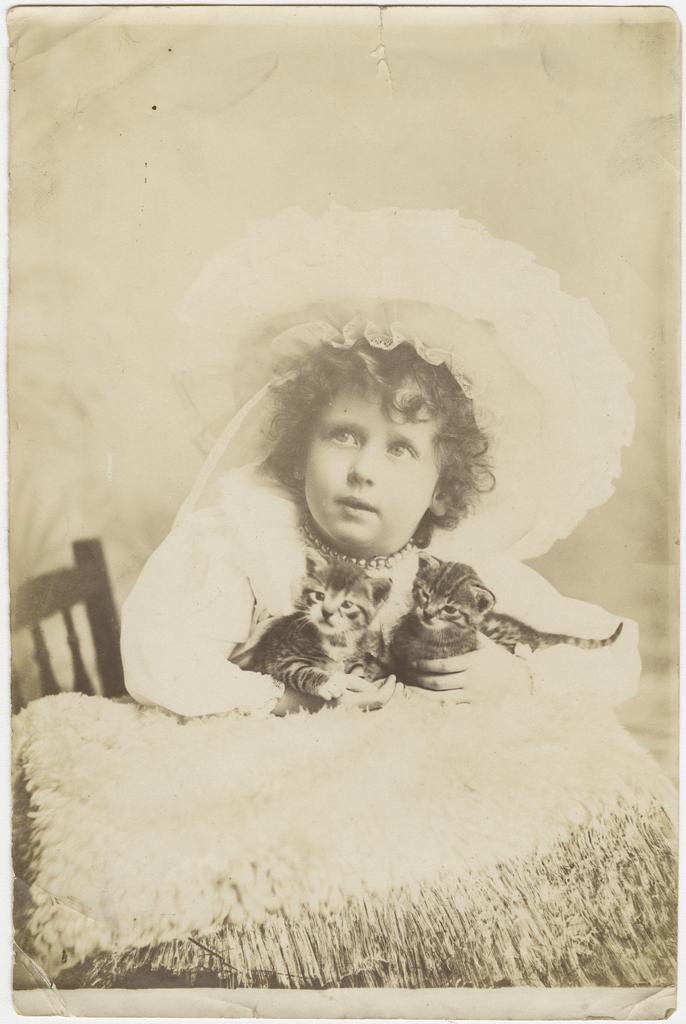 Elsie Annie Price with kittens