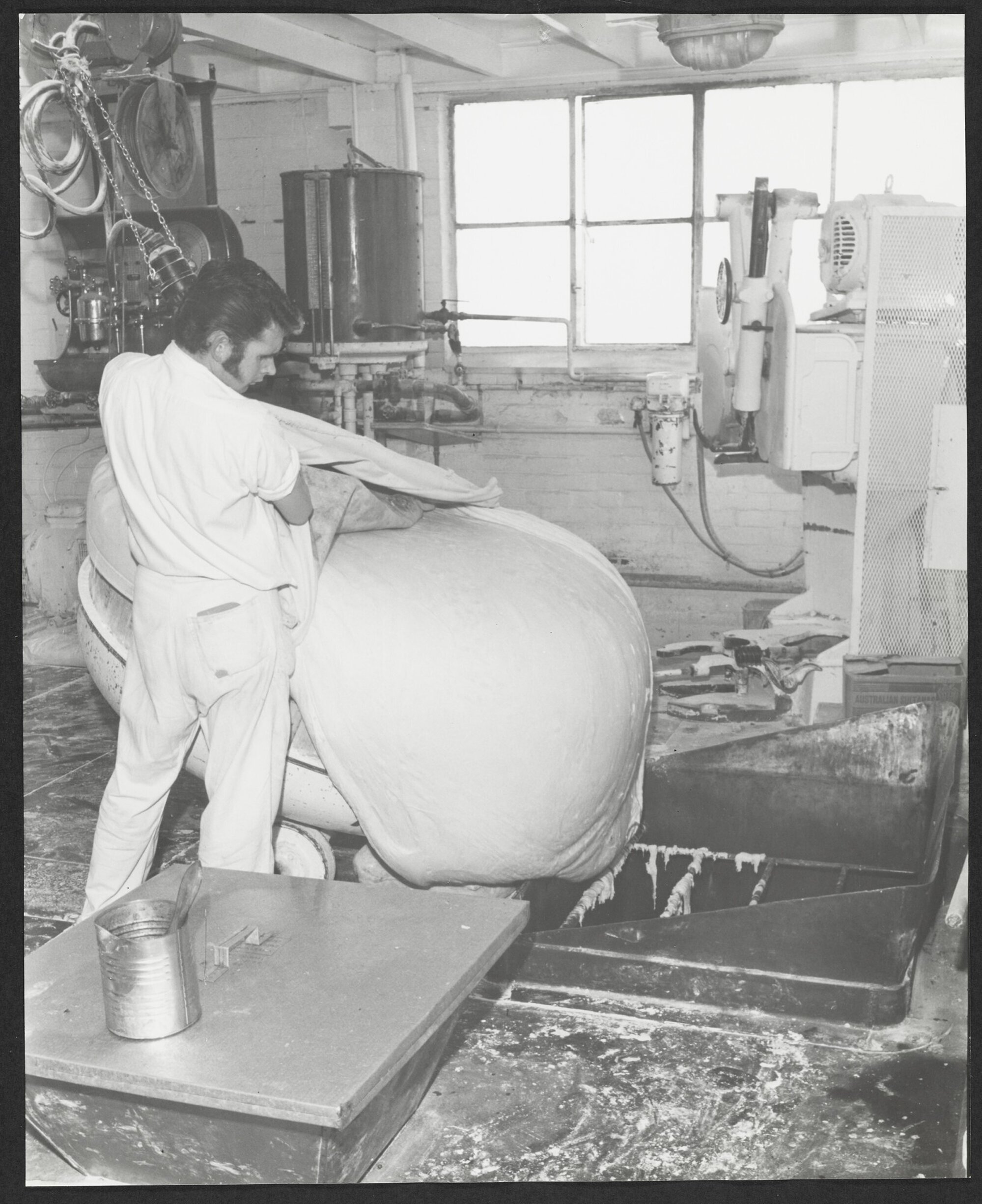 Man pouring dough at Laurenson's Bakery