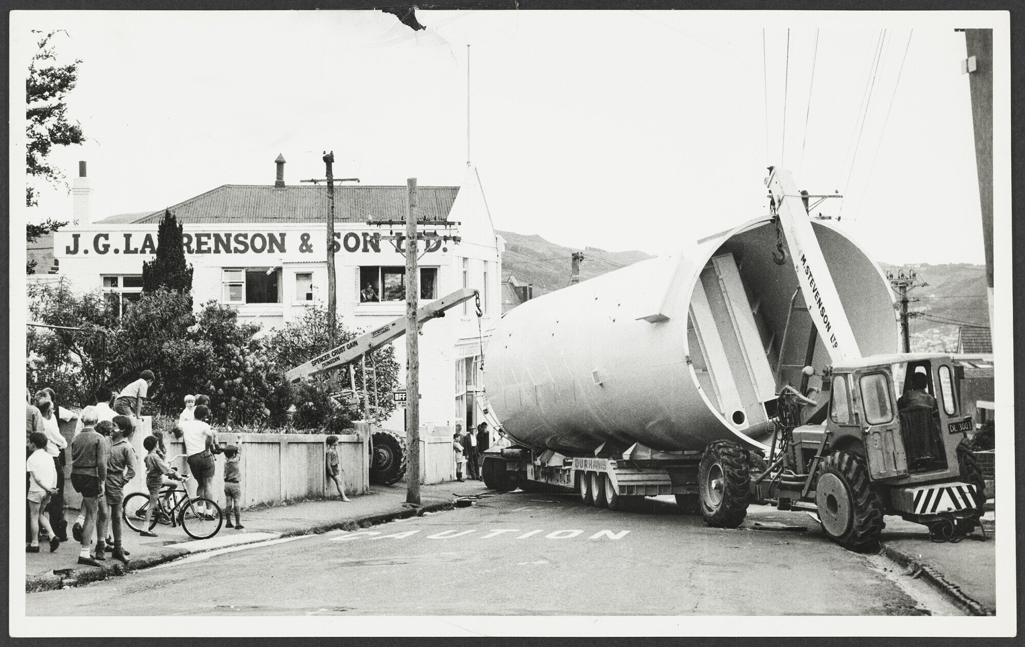 Truck with silo outside Laurenson's Bakery, Highgate, looking north