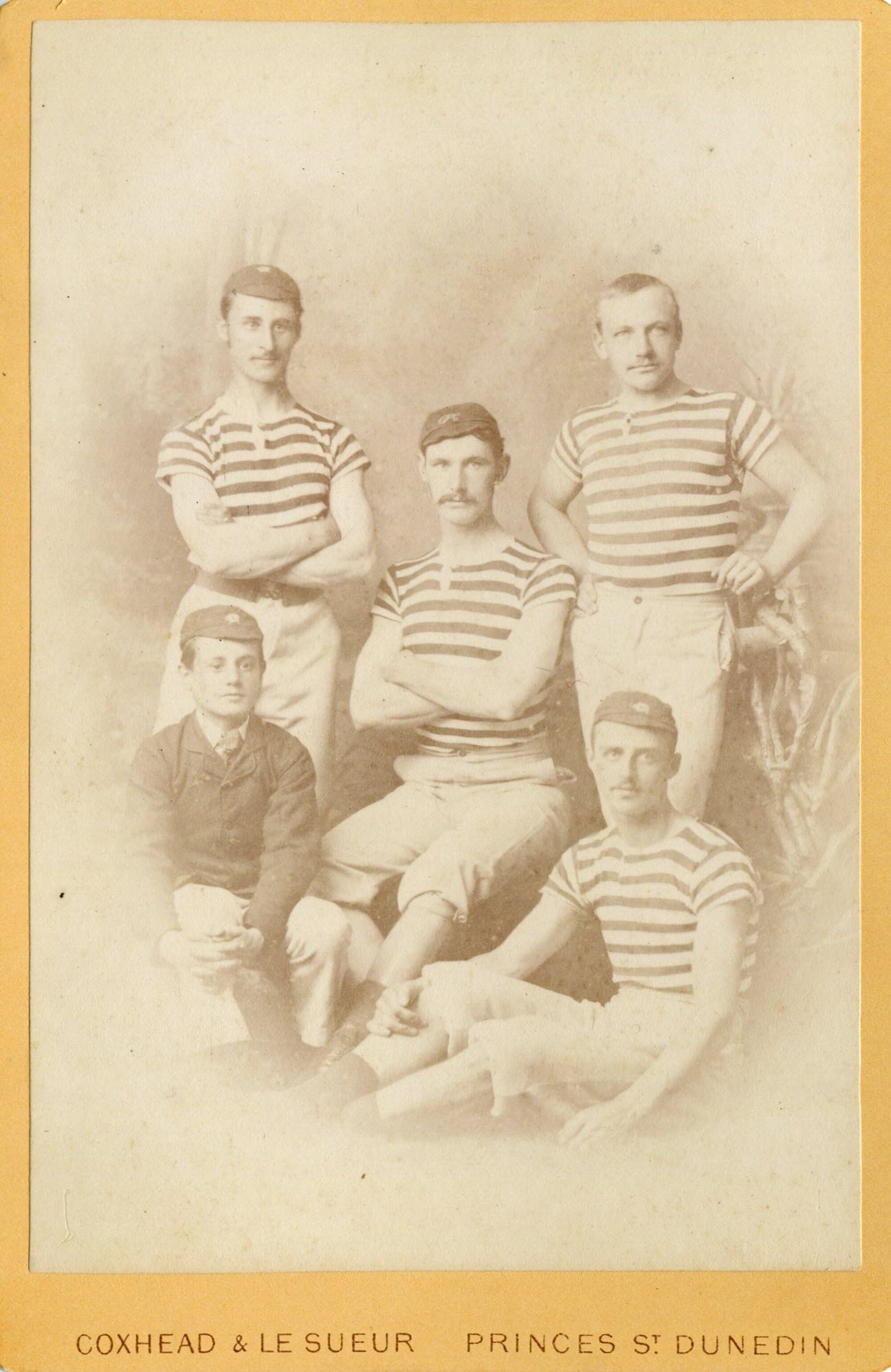 Five young men, probably a rowing team