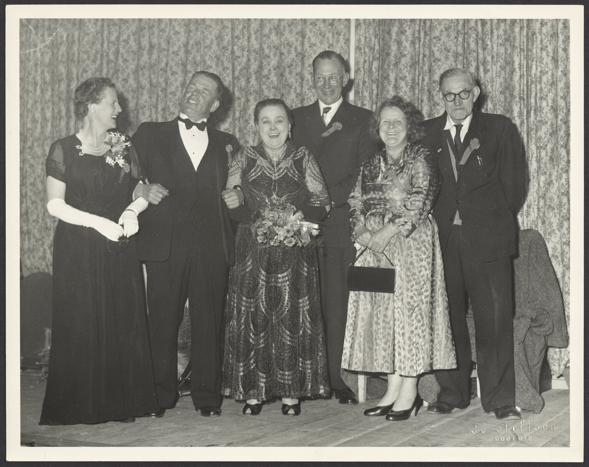 Mabel Howard and five others dressed for a formal occasion