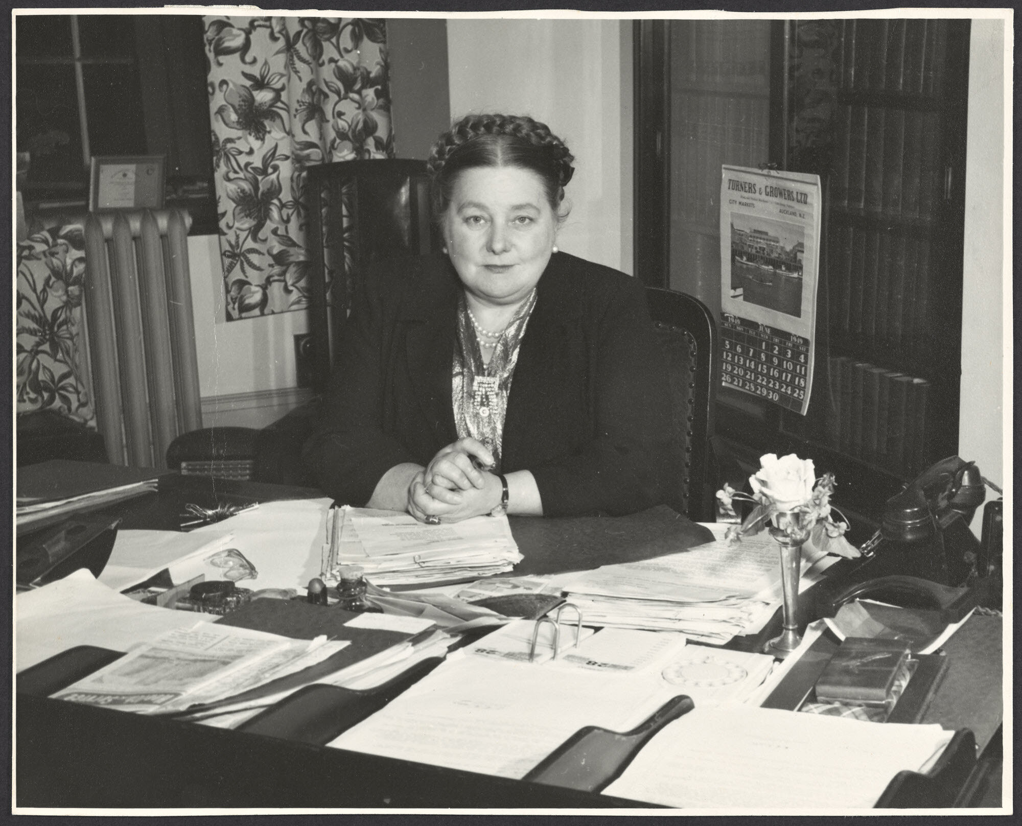 Mabel Howard sitting at her desk