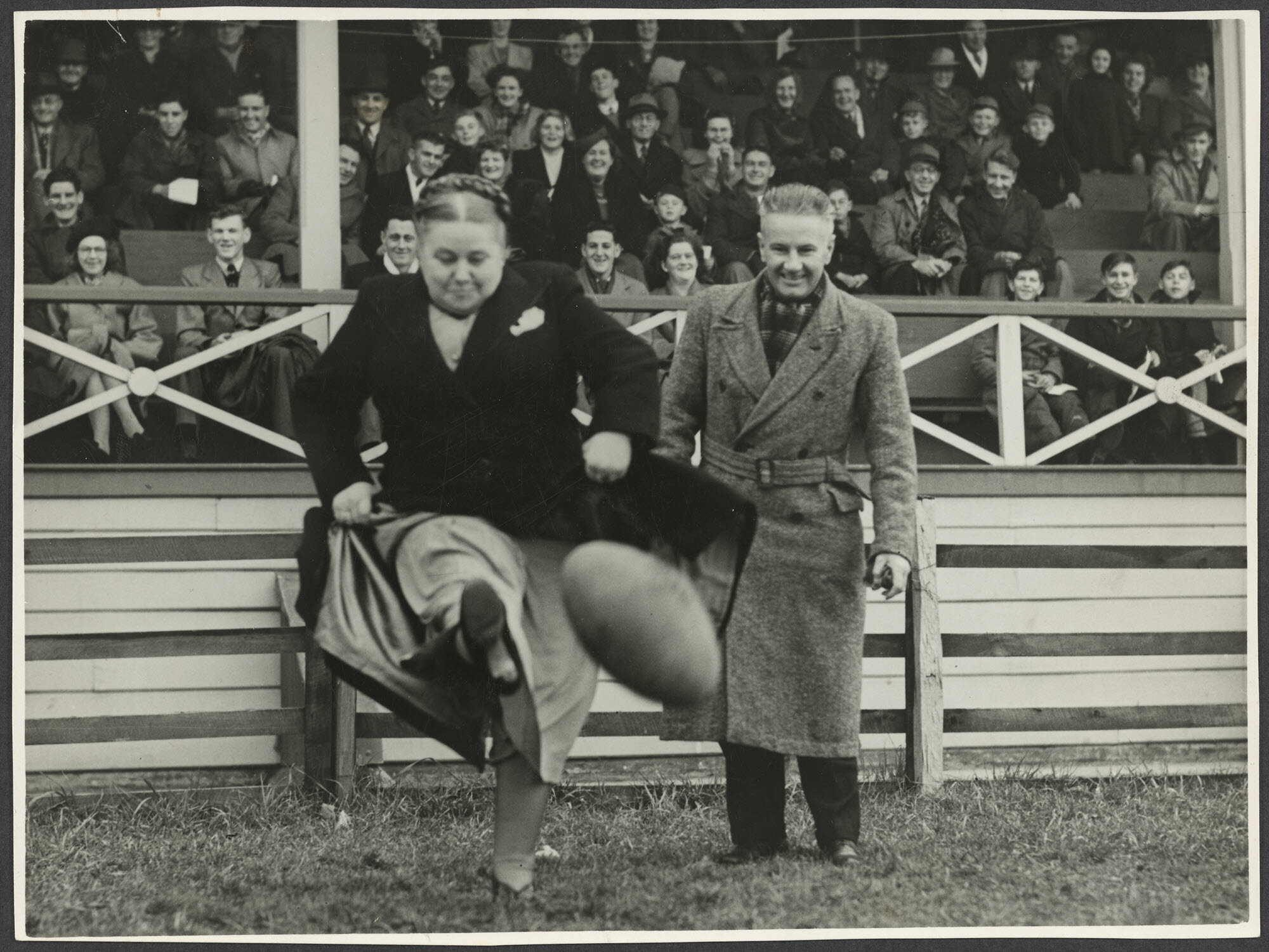 Mabel Howard kicking a rugby ball