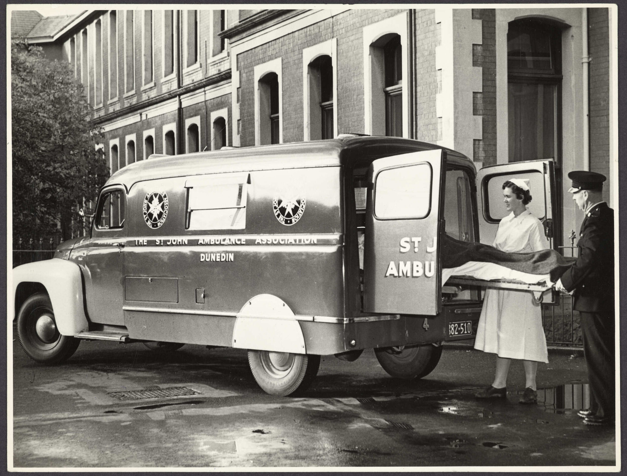 Ambulance at Dunedin Hospital, with staff and patient
