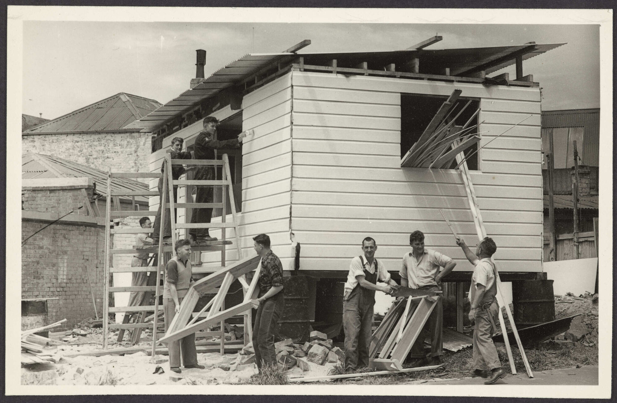 'Members of the St John Ambulance Brigade working on construction of a First Aid Post for Wanaka'