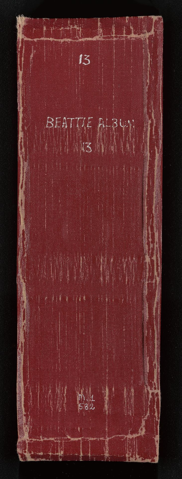 Newspaper clippings album, number 13