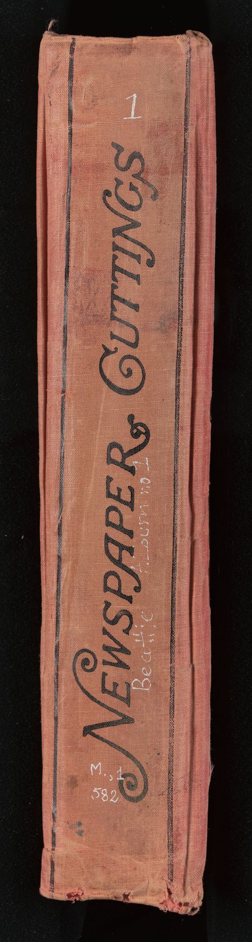 Newspaper clippings album, number 1