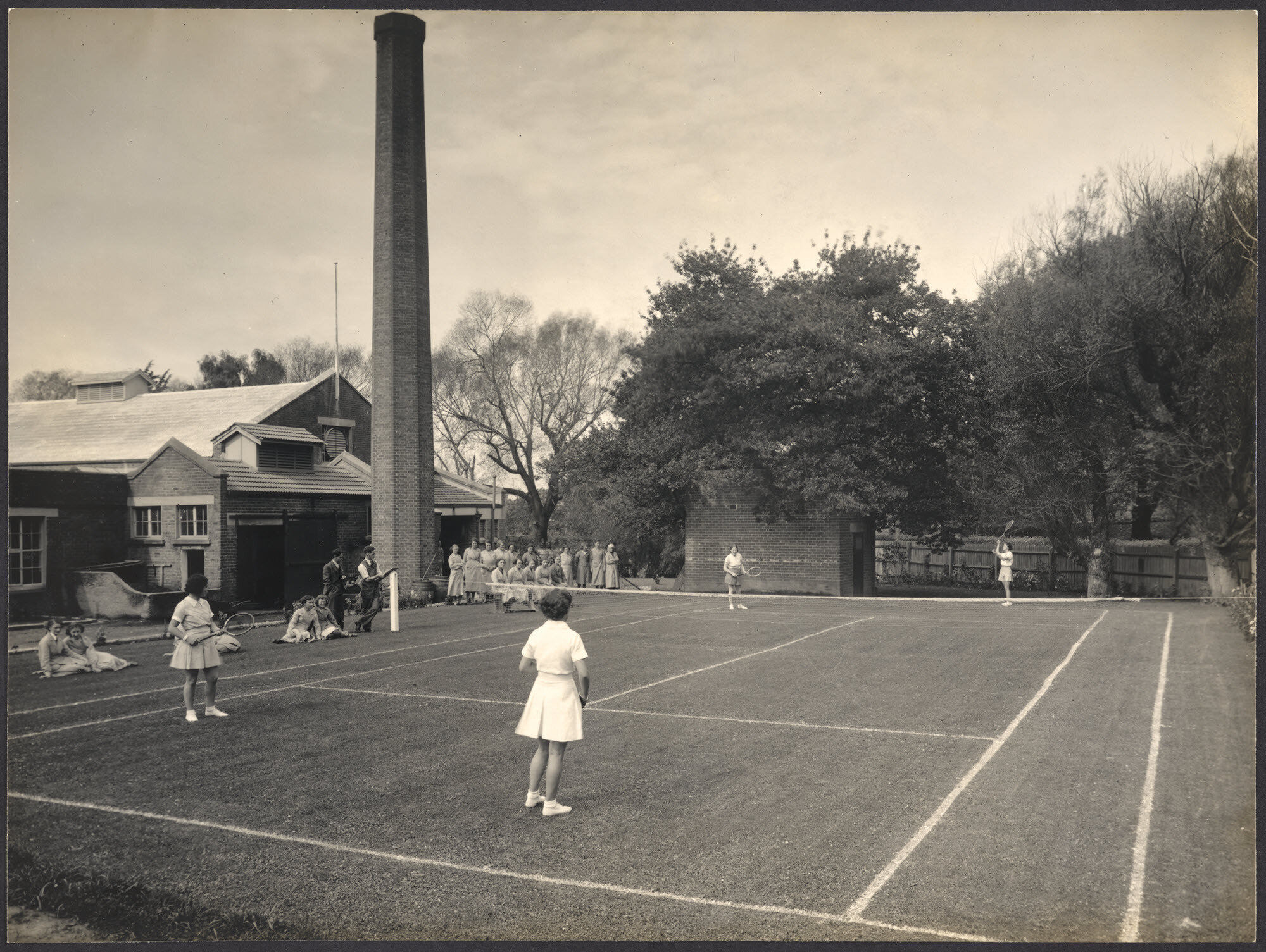 A Game of Tennis in Progress on Factory Court