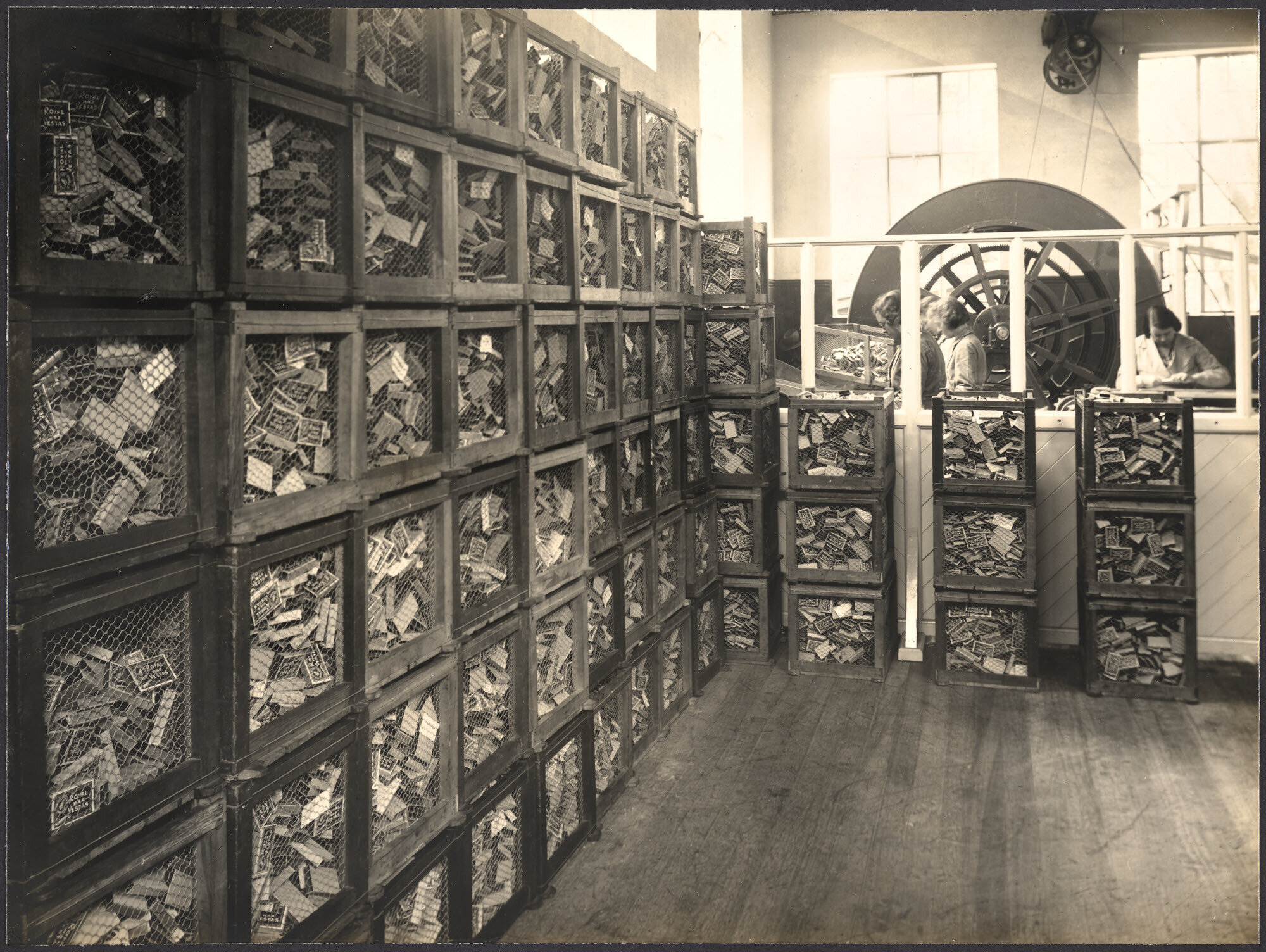 Collapsible Bins of Finished Match Boxes