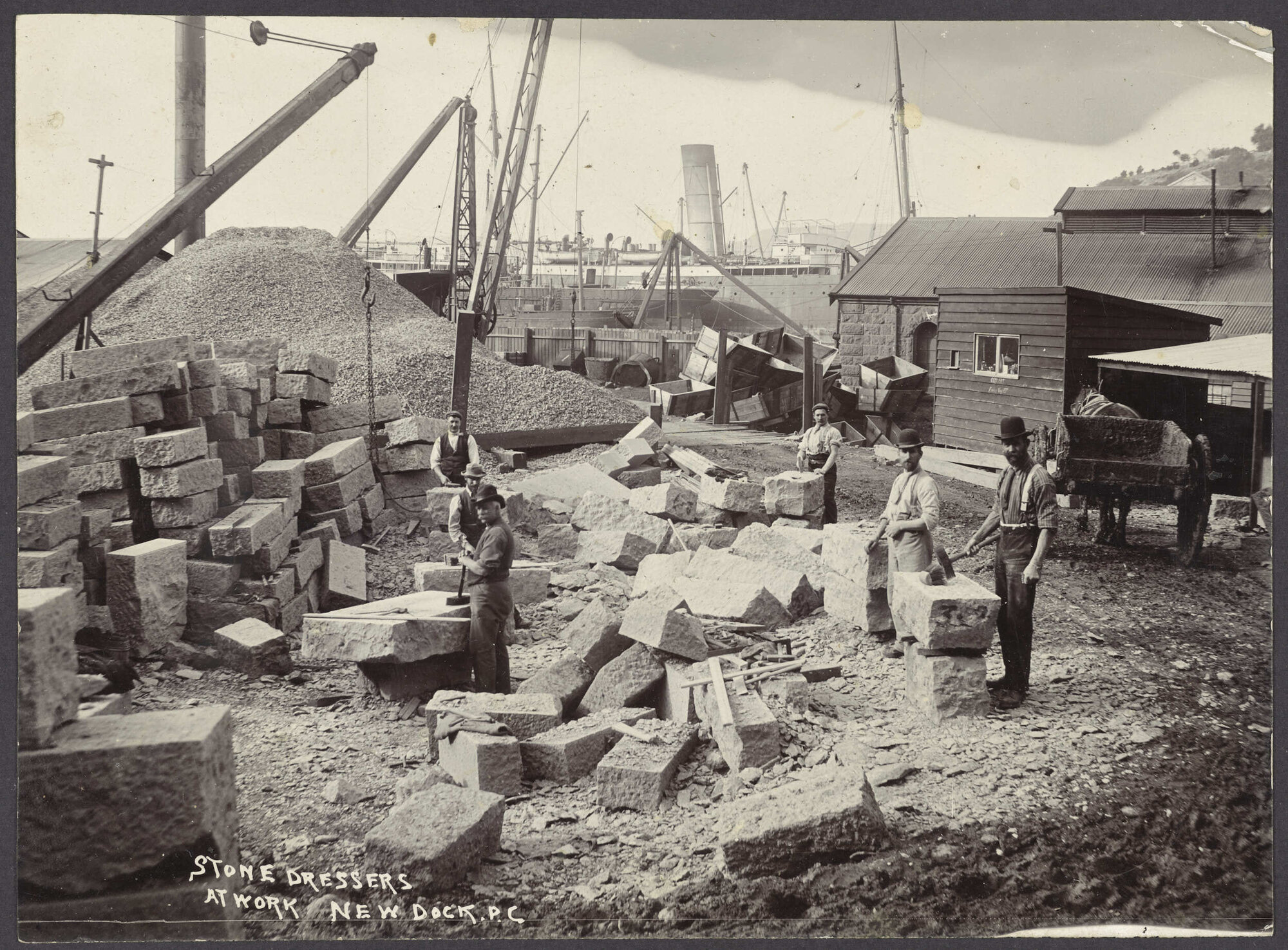 Stone dressers at work new dock. P.C. [Port Chalmers]