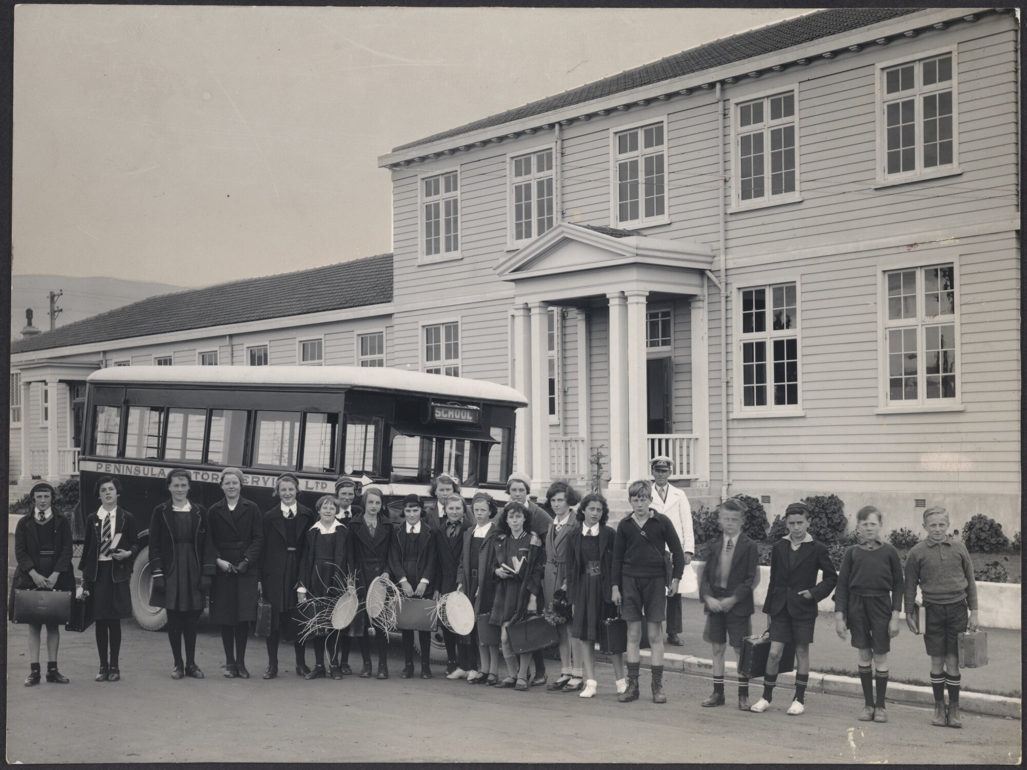 Children and driver with school bus, arrived at Dunedin North Intermediate School