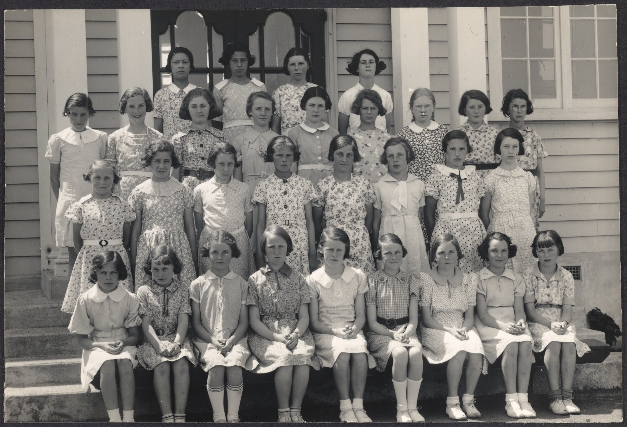 Girls of Dunedin North Intermediate School wearing summer frocks made by themselves