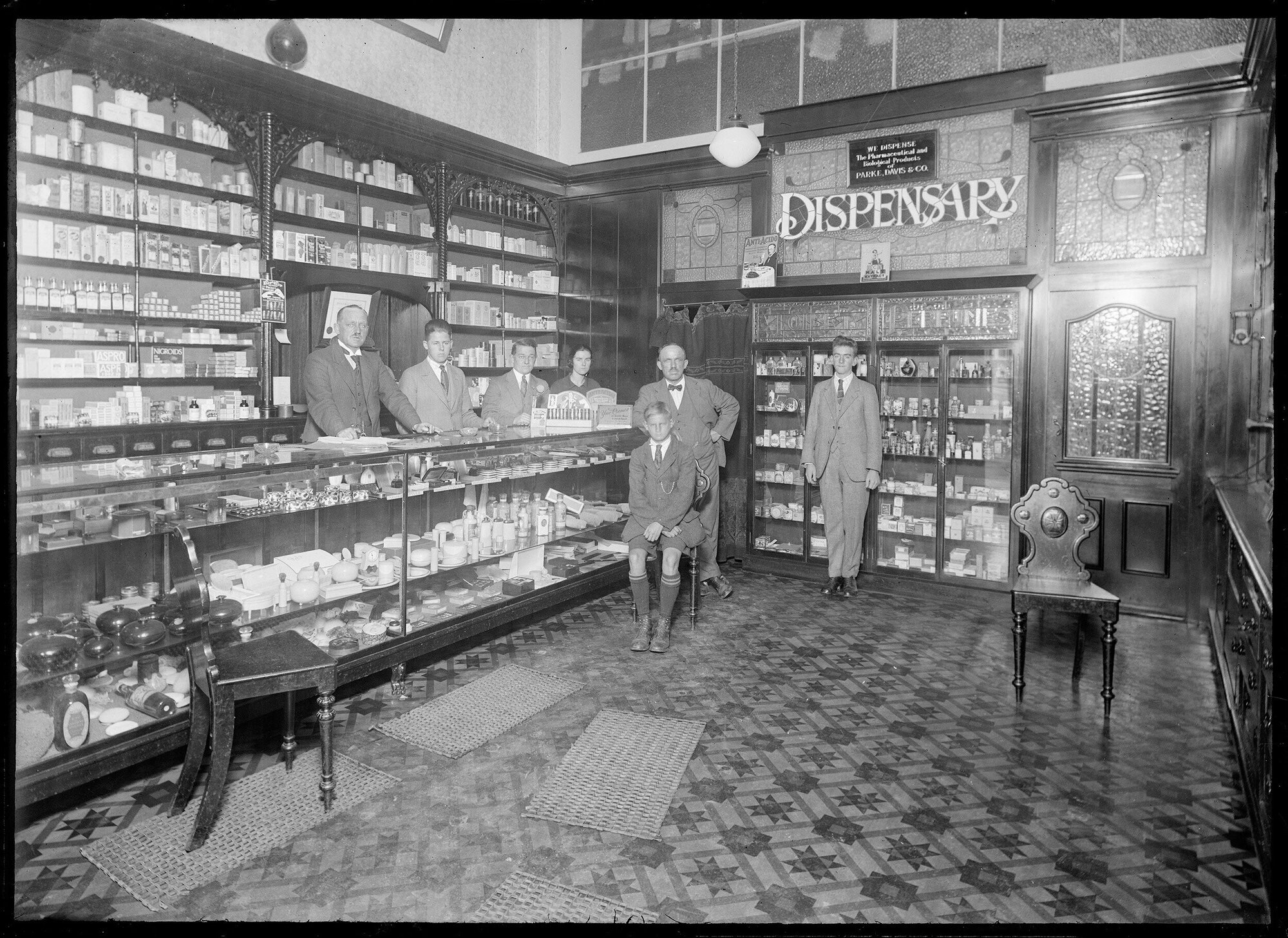 Chemist shop interior with staff