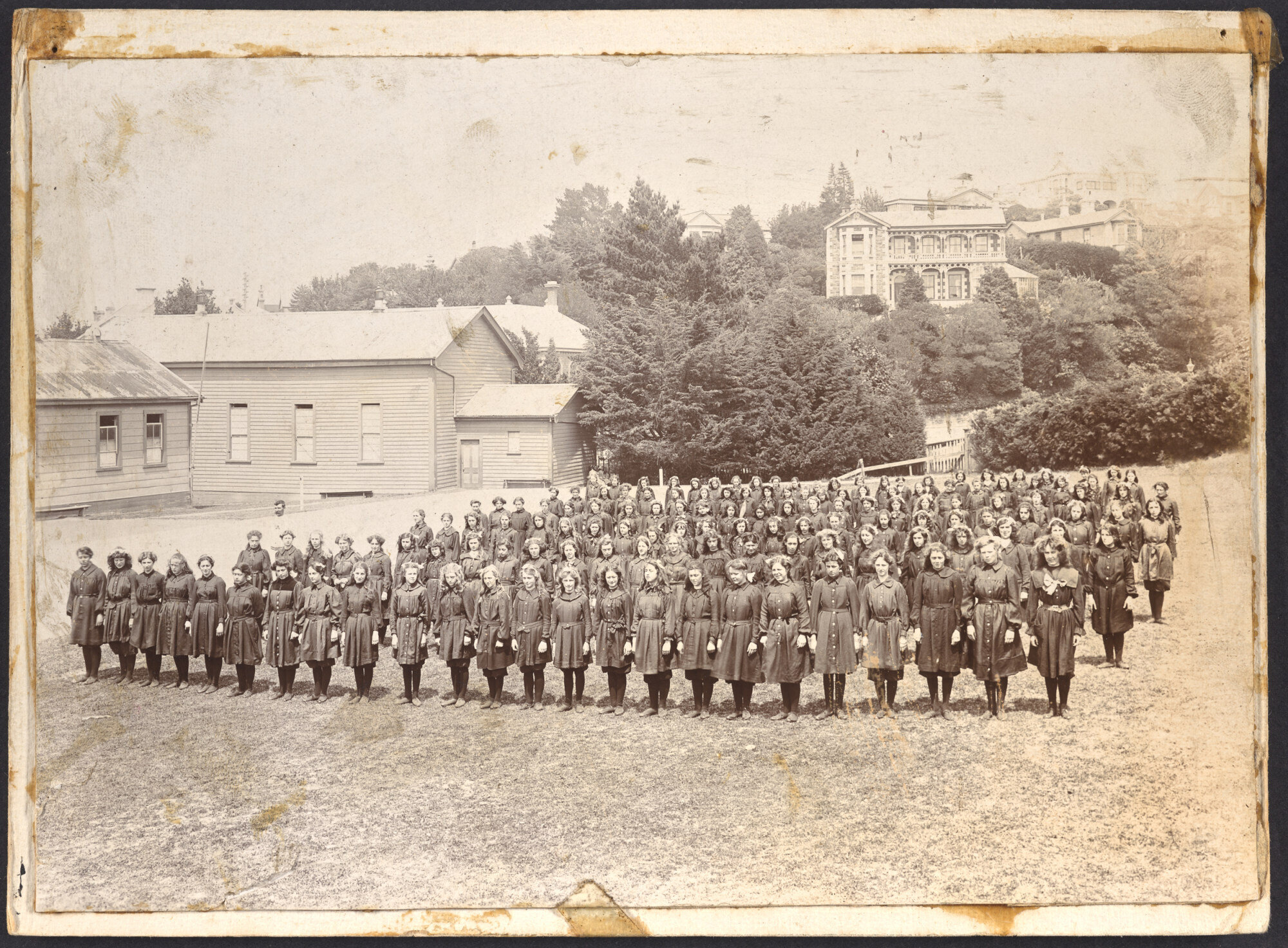 Assembled girls outdoors
