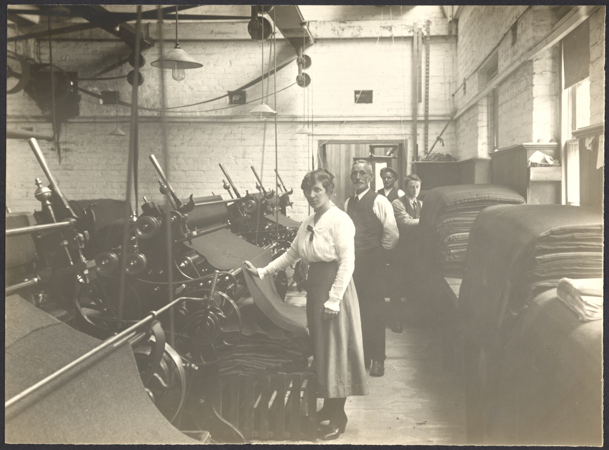 Workers with machinery and cloth