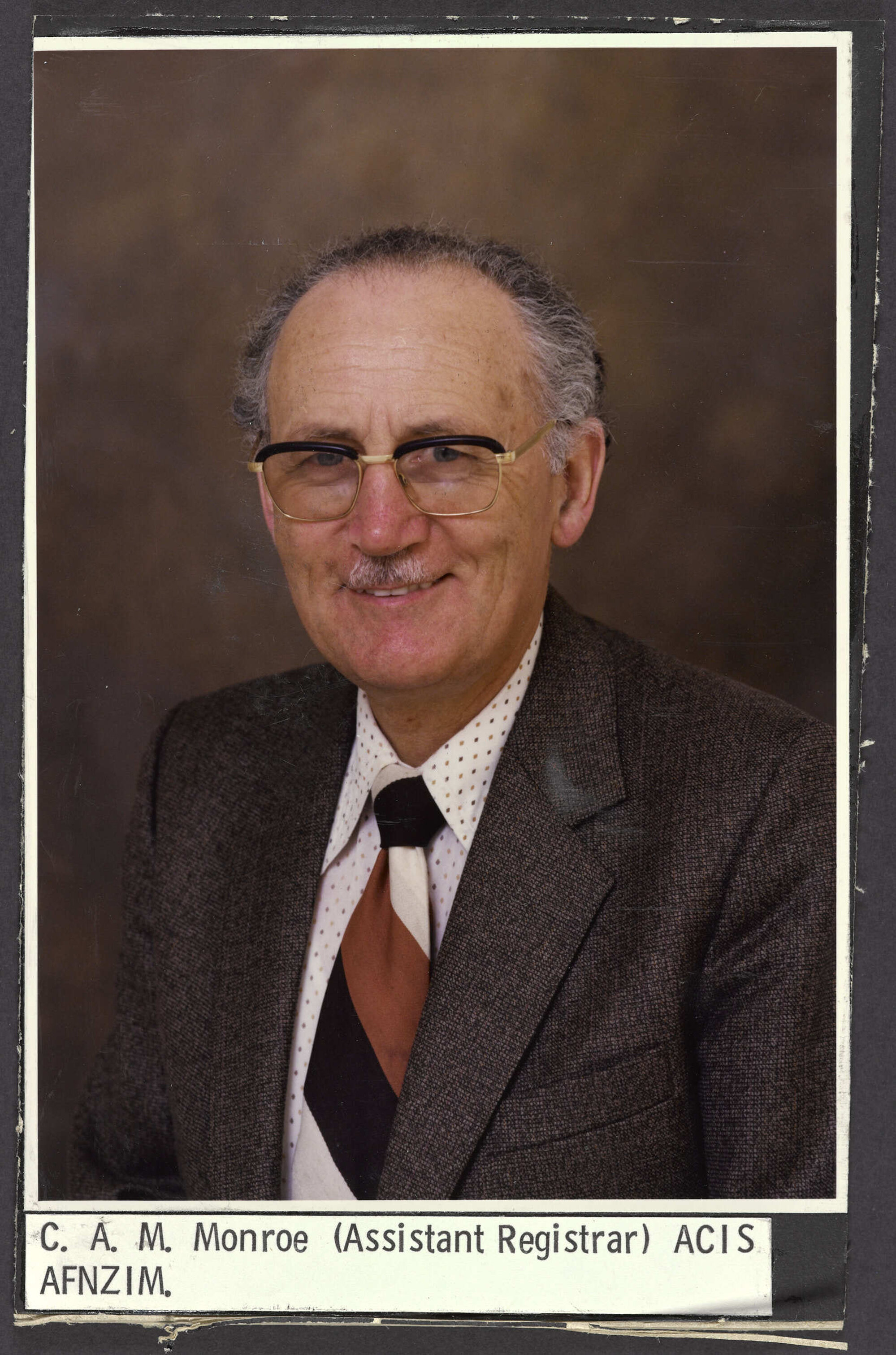 C.A.M. Monroe (Assistant Registrar)