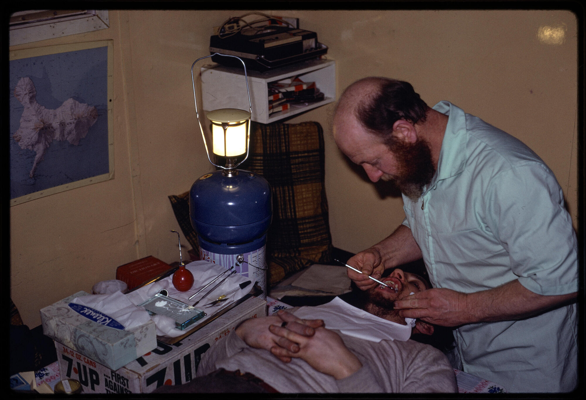 Lowe filling Lewis's tooth by gaslight