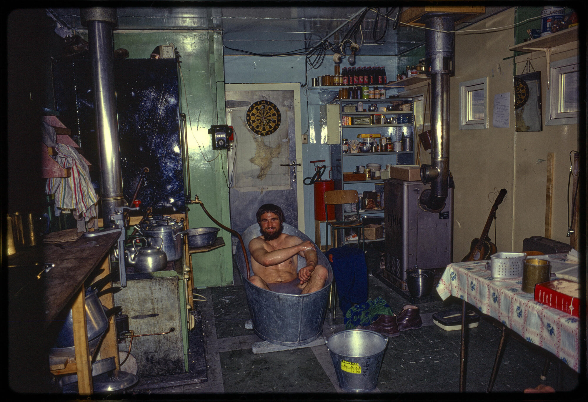 McKerrow bathing in mess hut